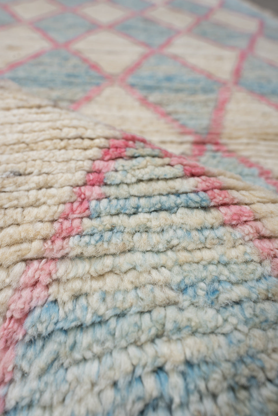 3' x 9' one-of-a-kind handmade vintage Tulu runner rug. Color palette: ivory, sky blue, pink, taupe, light blue, beige, gray