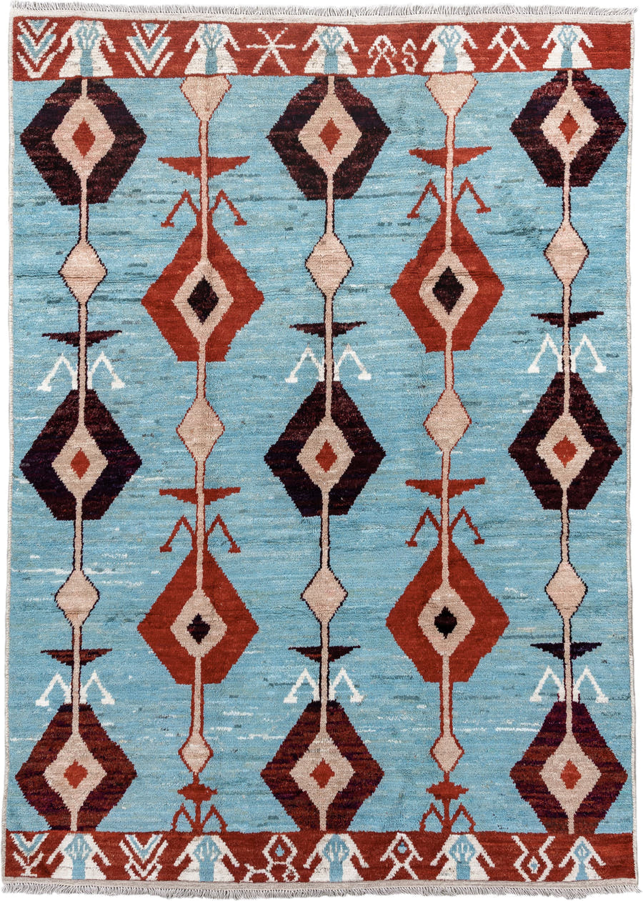 6' x 9' one-of-a-kind handmade vintage Tulu medium size rug. Color palette: sky blue, rust, ivory, plum, cream, terra cotta