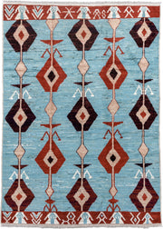 6' x 9' one-of-a-kind handmade vintage Tulu medium size rug. Color palette: sky blue, rust, ivory, plum, cream, terra cotta