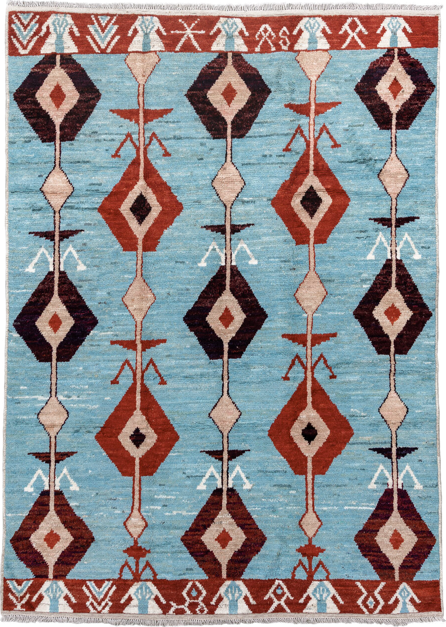 6' x 9' one-of-a-kind handmade vintage Tulu medium size rug. Color palette: sky blue, rust, ivory, plum, cream, terra cotta