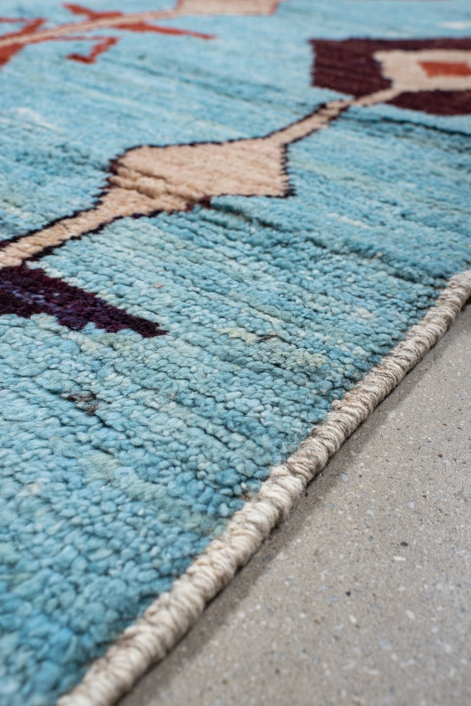 6' x 9' one-of-a-kind handmade vintage Tulu medium size rug. Color palette: sky blue, rust, ivory, plum, cream, terra cotta