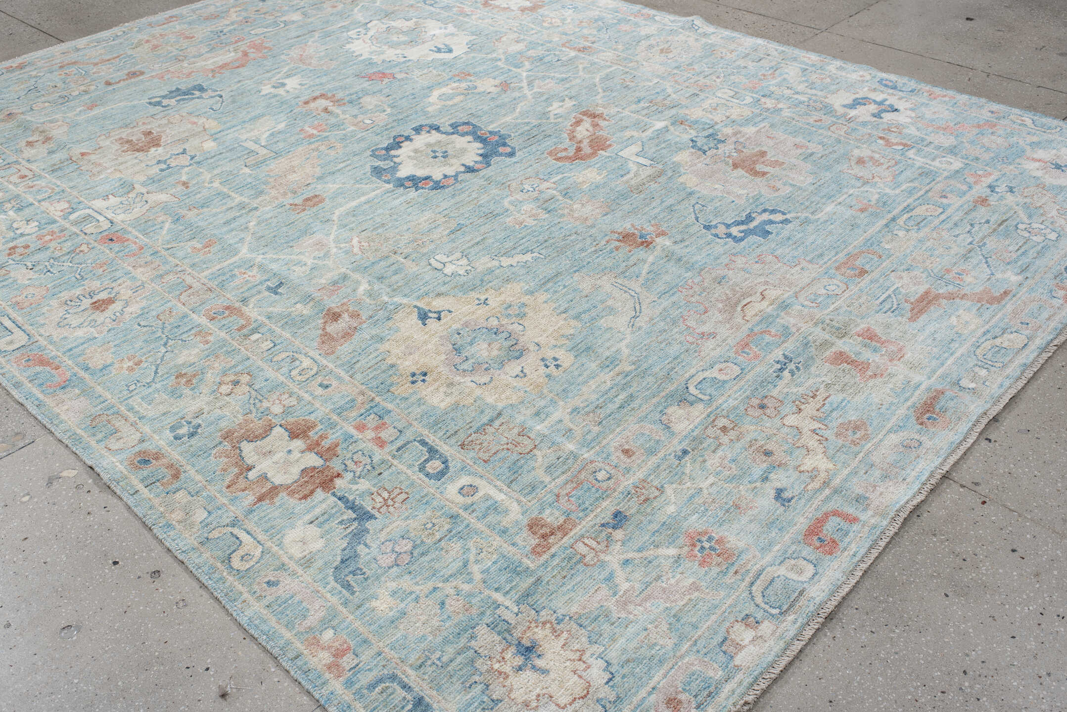 9' x 11' one-of-a-kind handmade vintage Oushak large size rug. Color palette: sky blue, ivory, blush, navy, rust, taupe