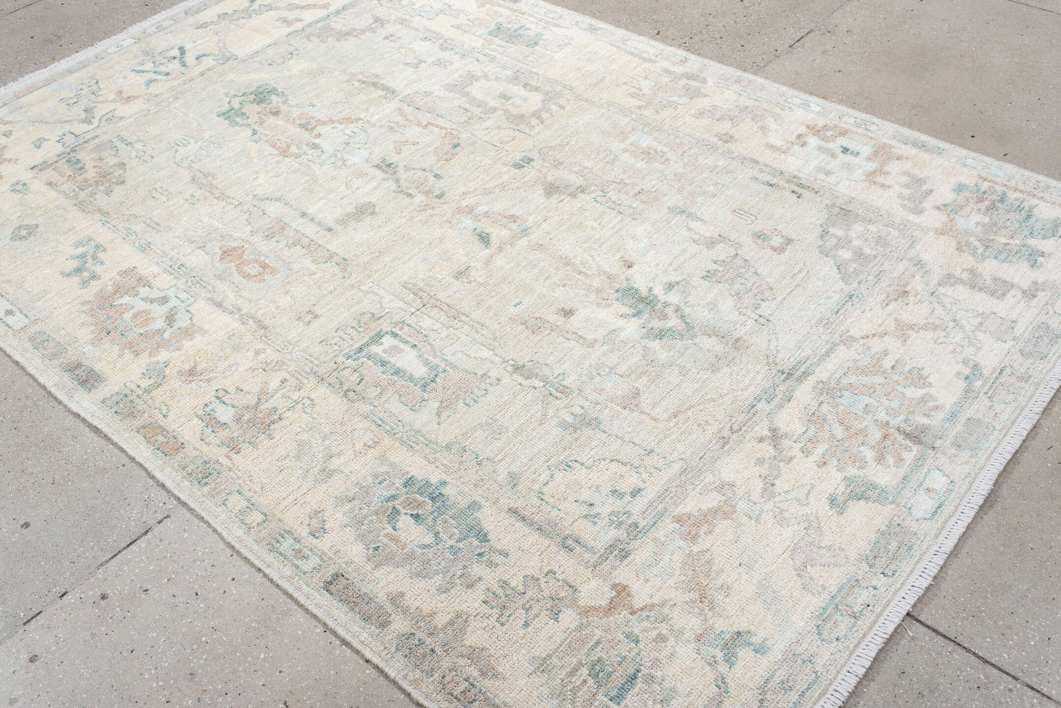 5' x 8' one-of-a-kind handmade vintage Oushak medium size rug. Color palette: ivory, pale blue, taupe, blush, light gray