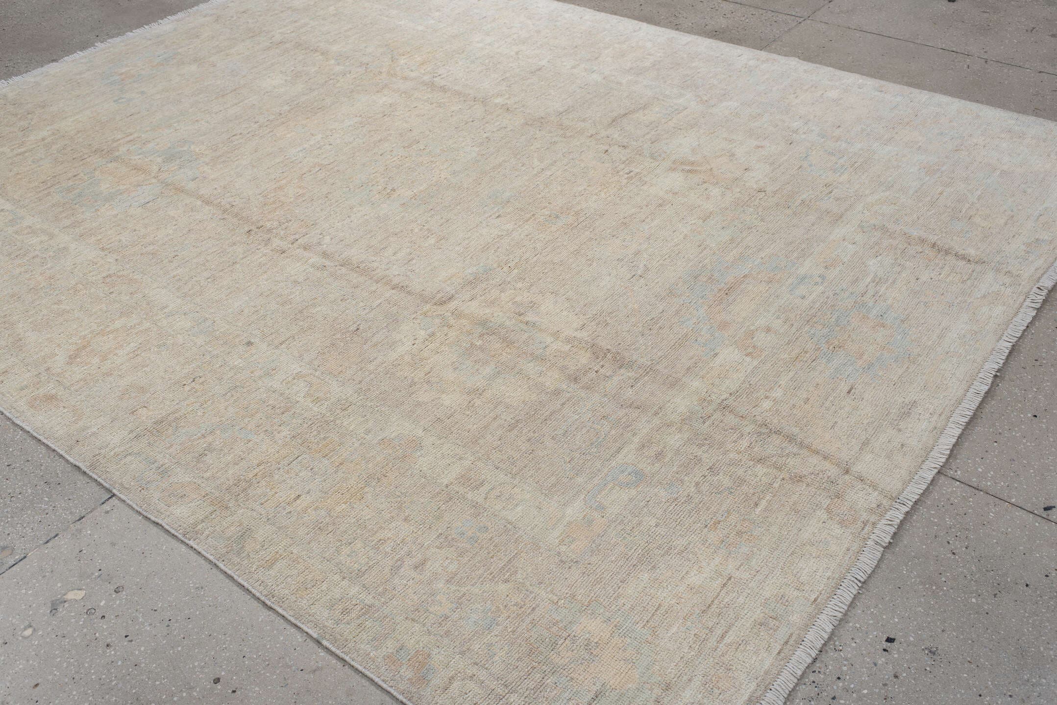 8' x 10' one-of-a-kind handmade vintage Oushak large size rug. Color palette: ivory, cream, pale blue, beige, taupe