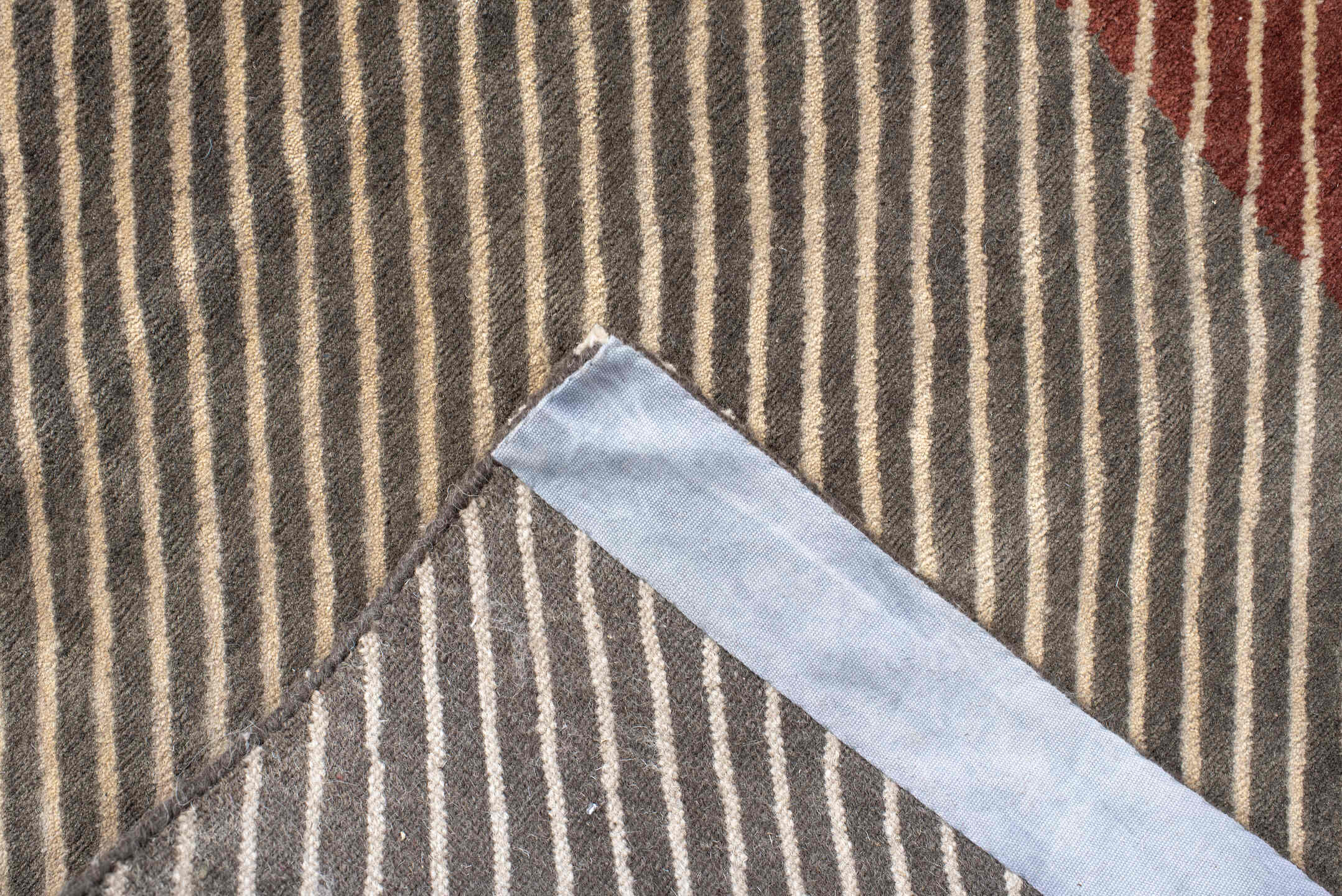 10' x 14' one-of-a-kind handmade vintage Tibetan large size rug. Color palette: taupe, ivory, charcoal, rust, terra cotta