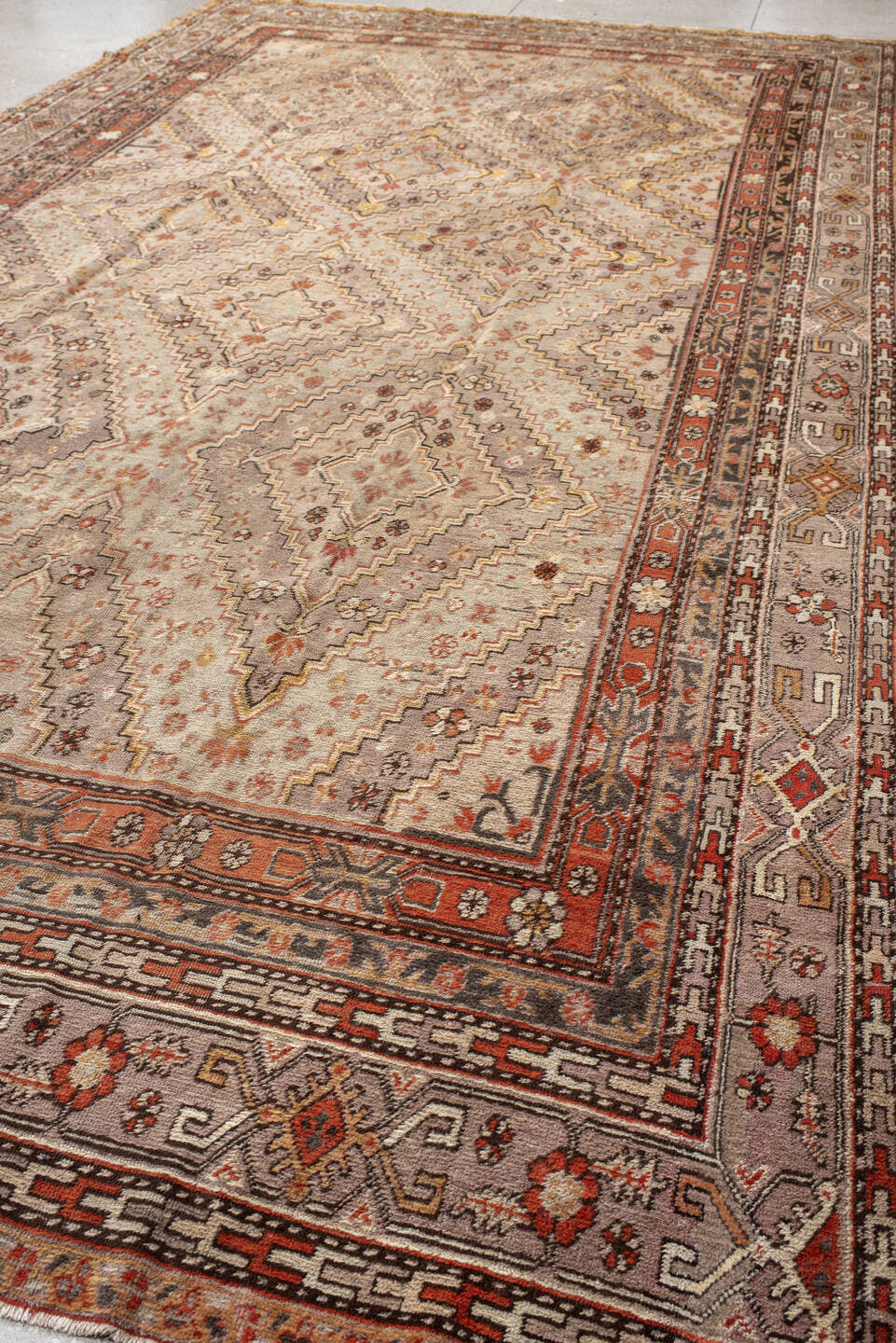 8' x 16' one-of-a-kind handmade vintage  rug. Color palette: ivory, taupe, rust, coral, charcoal, camel, sienna, beige, gray