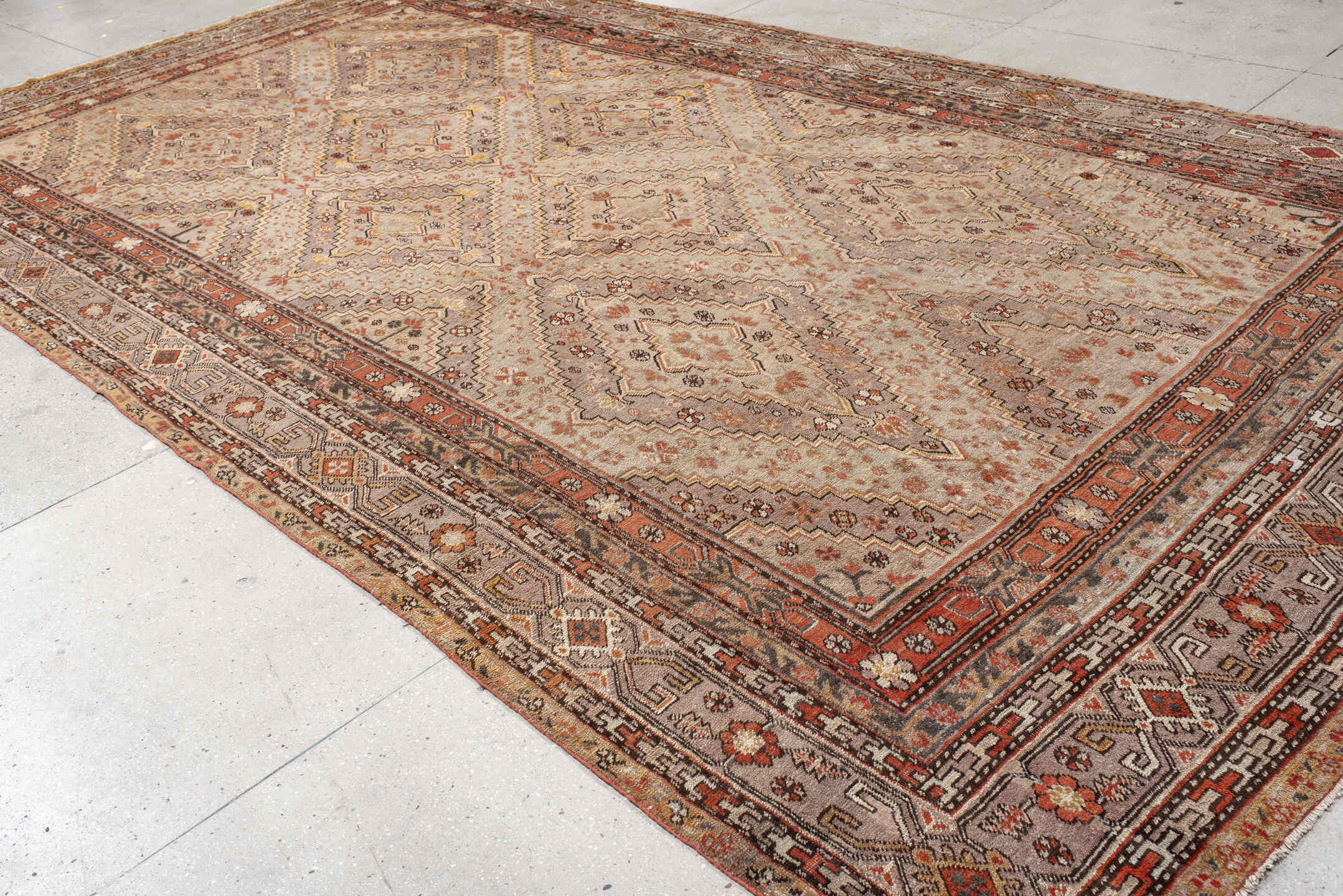 8' x 16' one-of-a-kind handmade vintage  rug. Color palette: ivory, taupe, rust, coral, charcoal, camel, sienna, beige, gray