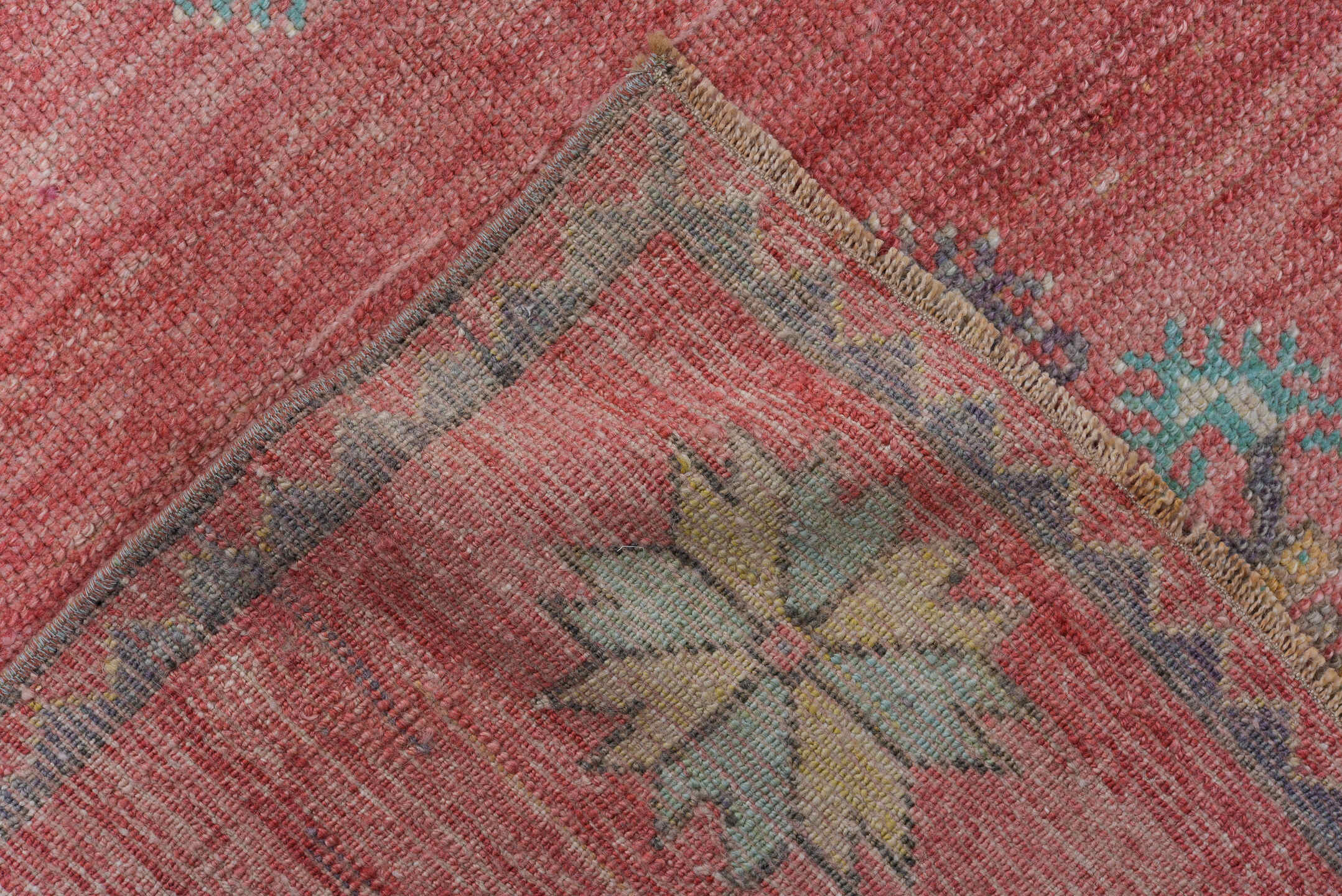 3' x 10' one-of-a-kind handmade antique Oushak runner rug. Color palette: coral, teal, slate, ivory, rose, gold, charcoal