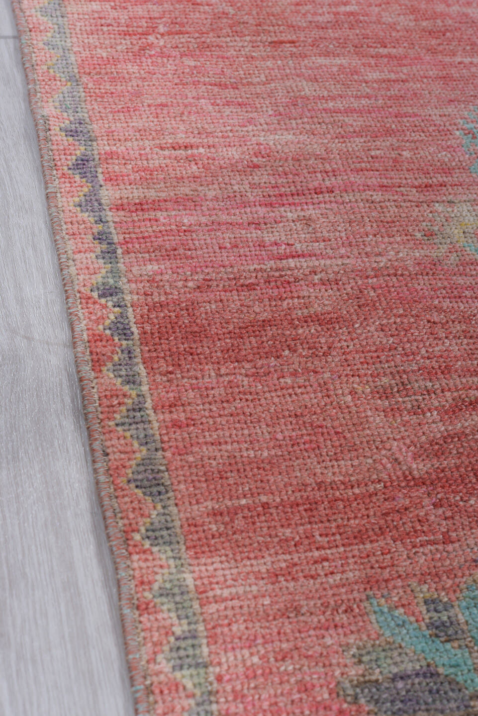 3' x 10' one-of-a-kind handmade antique Oushak runner rug. Color palette: coral, teal, slate, ivory, rose, gold, charcoal