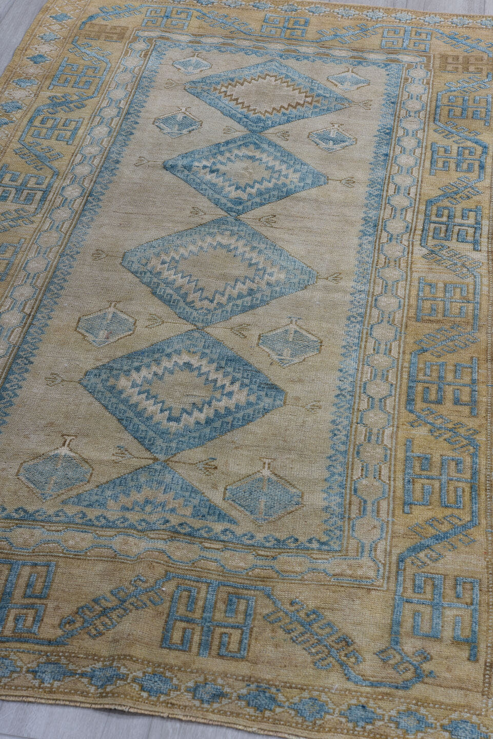 3' x 6' one-of-a-kind handmade antique Belouch small size rug. Color palette: ivory, sky blue, beige, camel, taupe