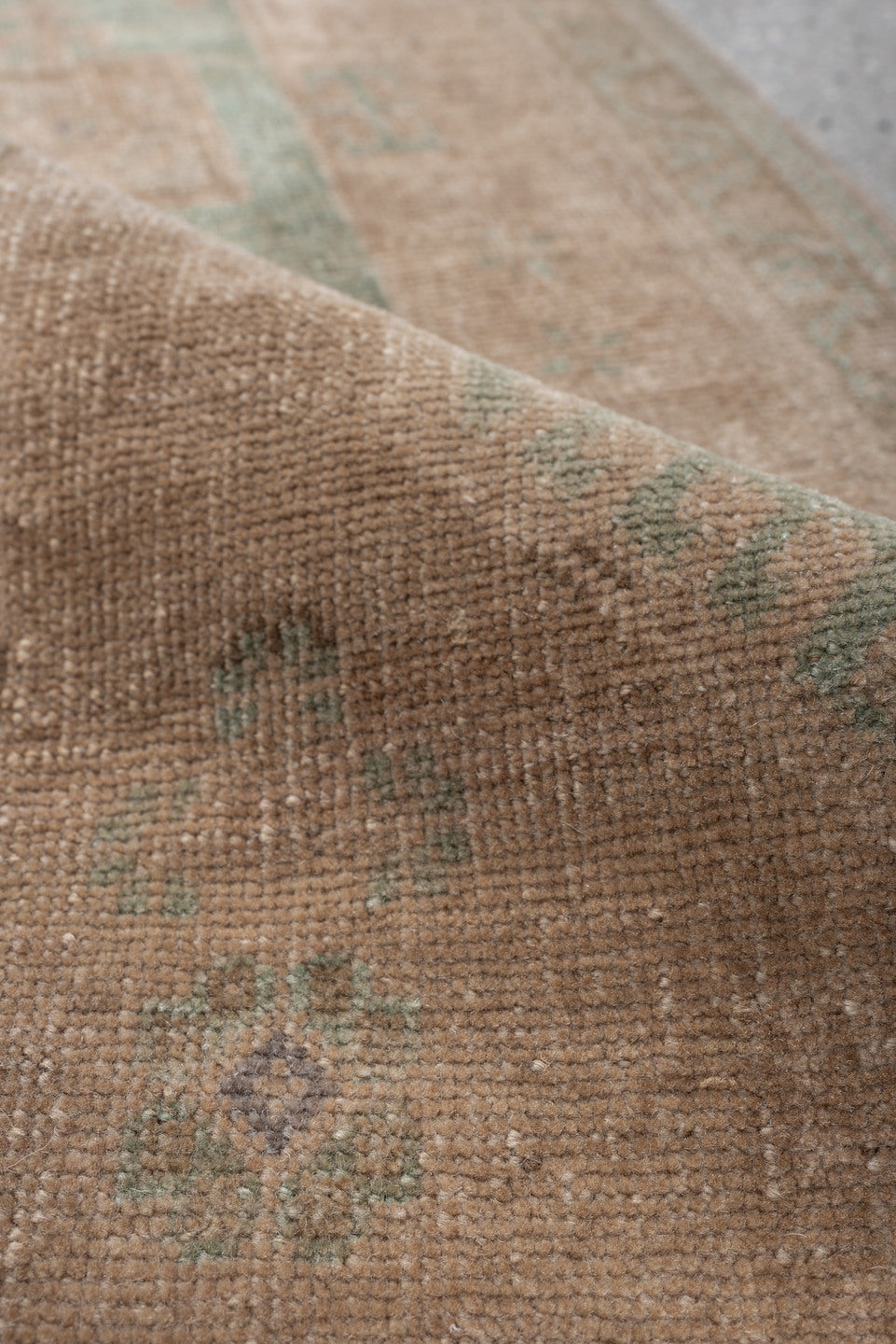 1' x 4' one-of-a-kind handmade vintage Oushak small size rug. Color palette: tan, sage, taupe, ivory, camel, beige, green