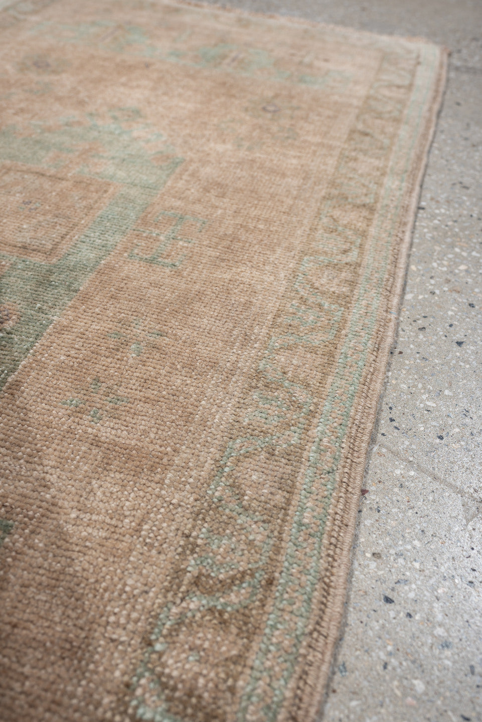 1' x 4' one-of-a-kind handmade vintage Oushak small size rug. Color palette: tan, sage, taupe, ivory, camel, beige, green