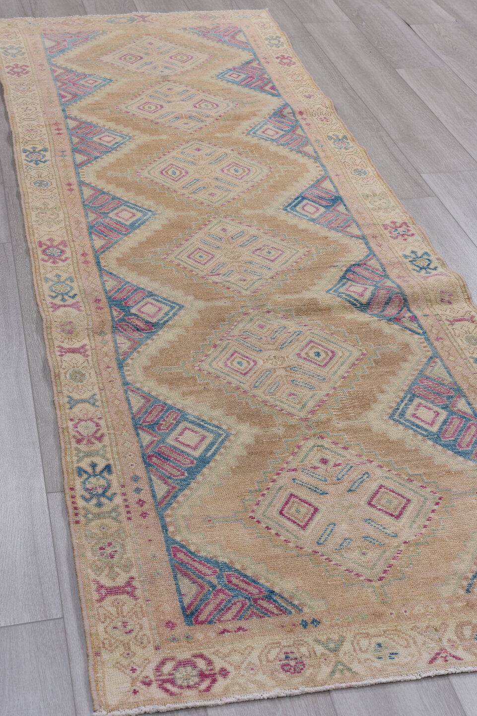 3' x 10' one-of-a-kind handmade vintage Malayer runner rug. Color palette: blue, brown, gray, light gray, off-white, pink