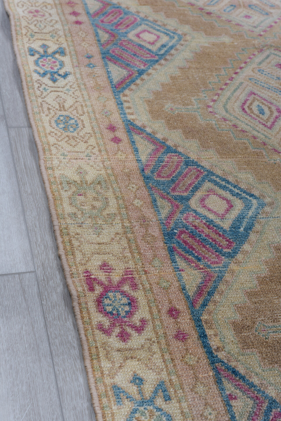 3' x 10' one-of-a-kind handmade vintage Malayer runner rug. Color palette: blue, brown, gray, light gray, off-white, pink