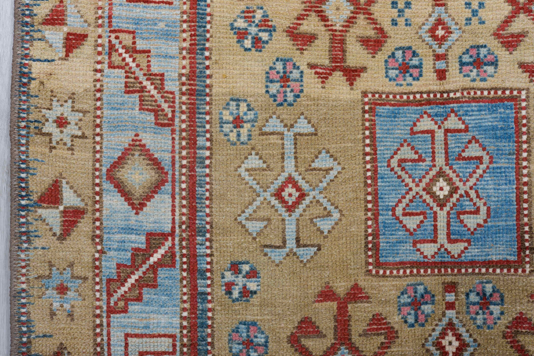 3' x 13' one-of-a-kind handmade antique Caucasian runner rug. Color palette: red, ivory, sky blue, camel, rust, navy