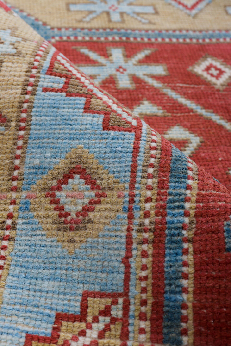 3' x 13' one-of-a-kind handmade antique Caucasian runner rug. Color palette: red, ivory, sky blue, camel, rust, navy