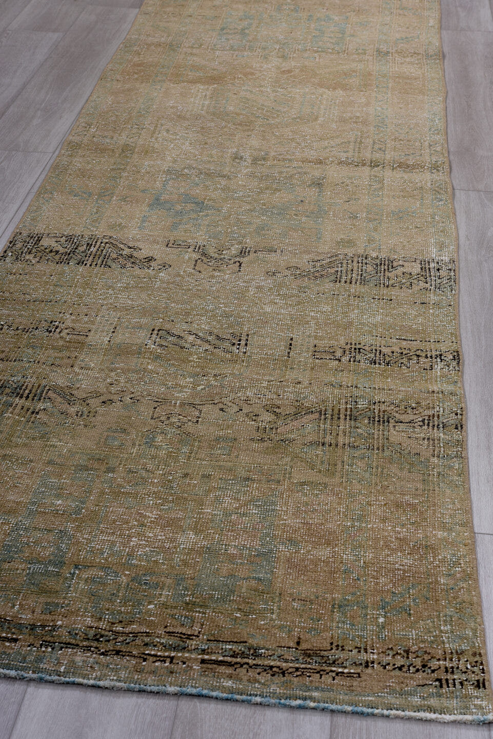 3' x 10' one-of-a-kind handmade antique Heriz runner rug. Color palette: taupe, camel, beige, pale_blue, ivory, brown, gray