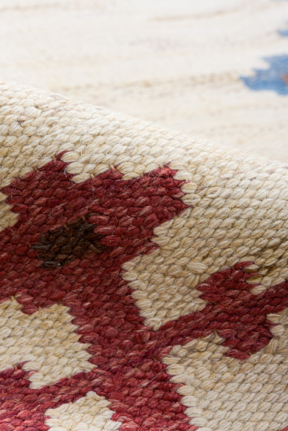 5' x 6' one-of-a-kind handmade vintage Rollaken rug. Color palette: blue, brown, gray, light gray, off-white, orange, pink