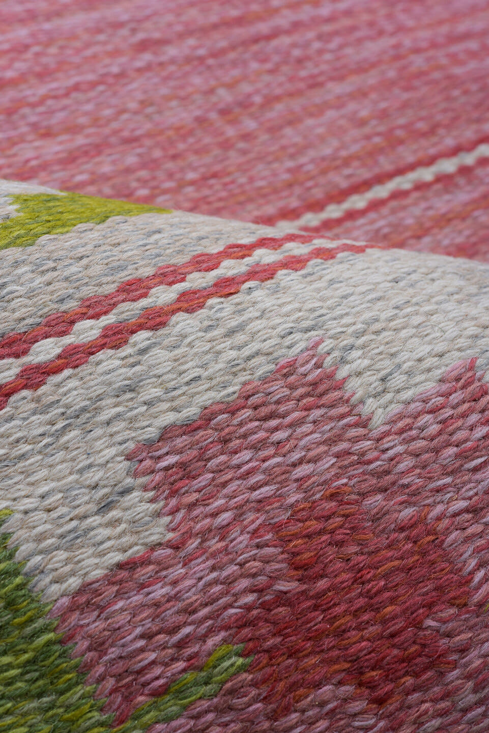 6' x 9' one-of-a-kind handmade vintage Rollaken medium size rug. Color palette: rose, ivory, olive, sage, pink, red, green
