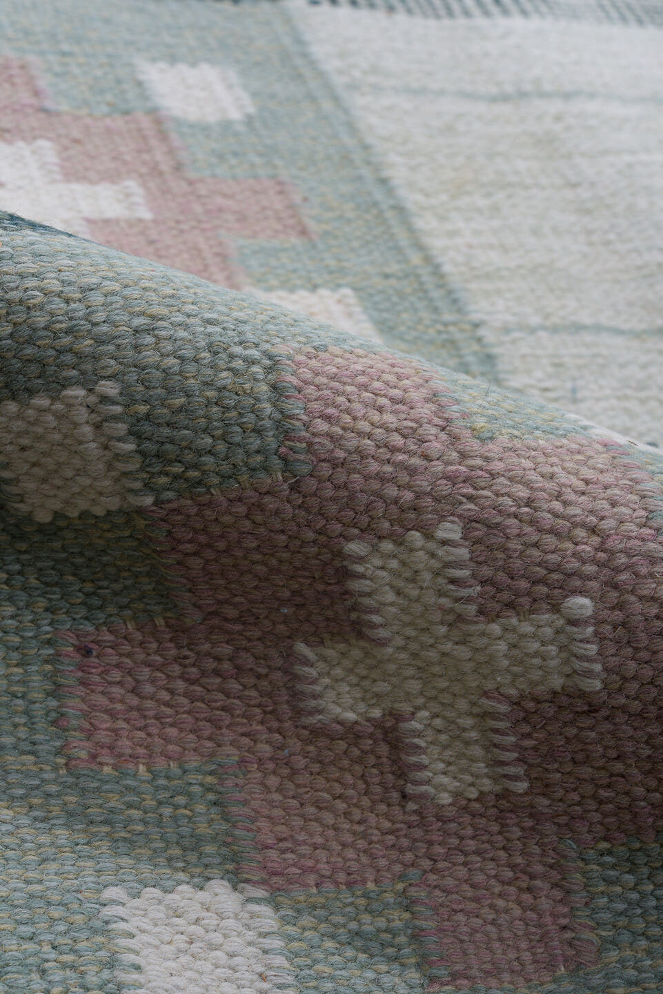 5' x 8' one-of-a-kind handmade antique Rollaken medium size rug. Color palette: ivory, sage, green, rose, cream, pink, red