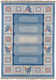 5' x 7' one-of-a-kind handmade antique Rollaken rug. Color palette: blue, ivory, navy, peach, pink, beige, terracotta