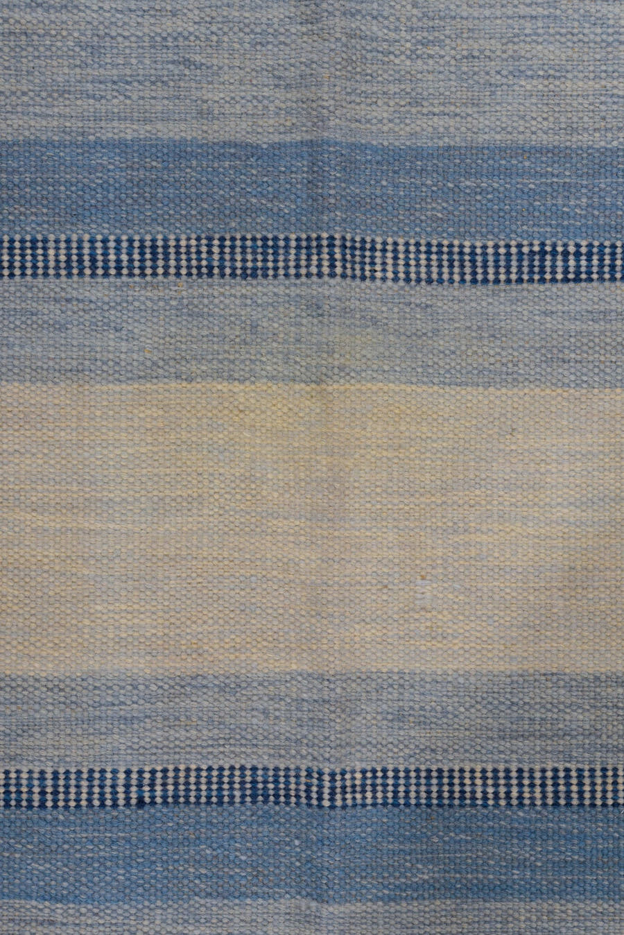 5' x 7' one-of-a-kind handmade antique Rollaken rug. Color palette: blue, ivory, navy, peach, pink, beige, terracotta