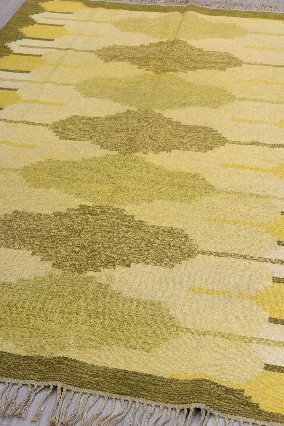 5' x 8' one-of-a-kind handmade antique Rollaken medium size rug. Color palette: olive, ivory, yellow, taupe, cream, green