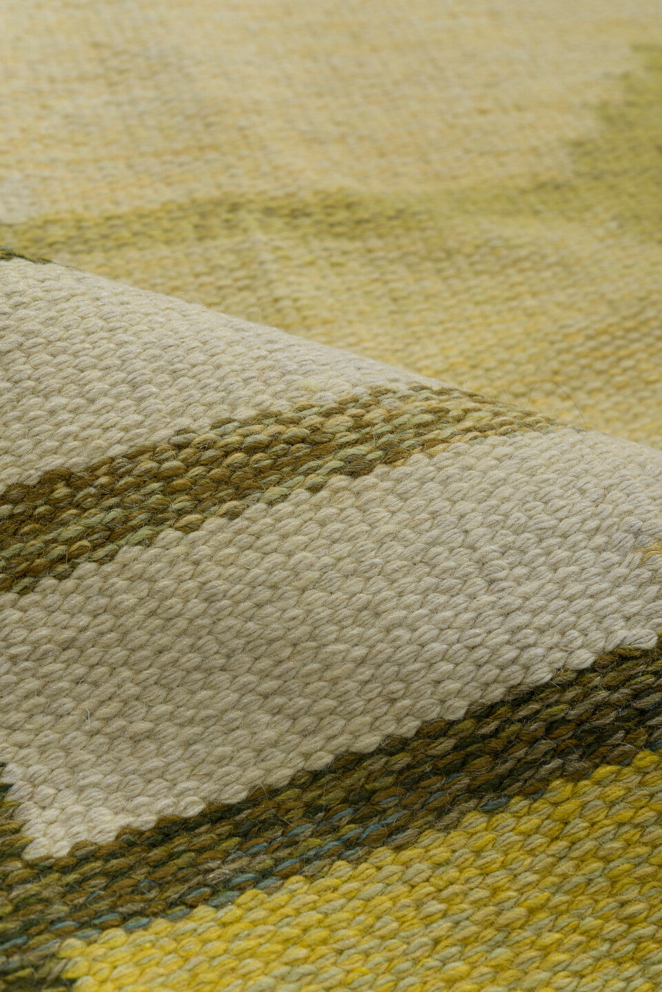 5' x 8' one-of-a-kind handmade antique Rollaken medium size rug. Color palette: olive, ivory, yellow, taupe, cream, green