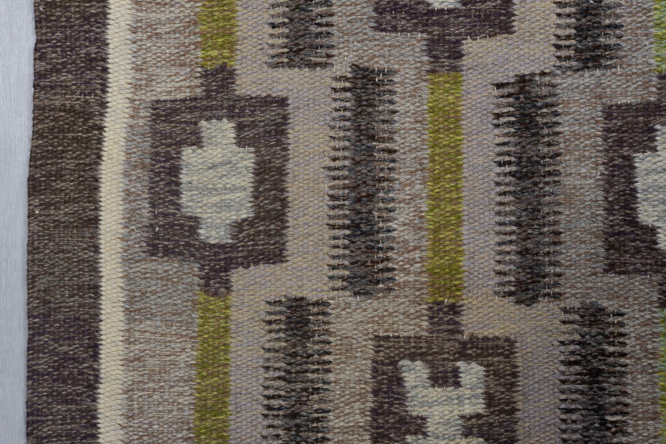 4' x 8' one-of-a-kind handmade vintage Rollaken rug. Color palette: brown, dark gray, dark khaki, gray, light gray