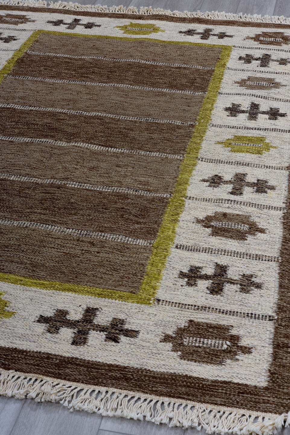5' x 7' one-of-a-kind handmade antique Rollaken rug. Color palette: brown, ivory, taupe, olive, camel, beige, gray, green