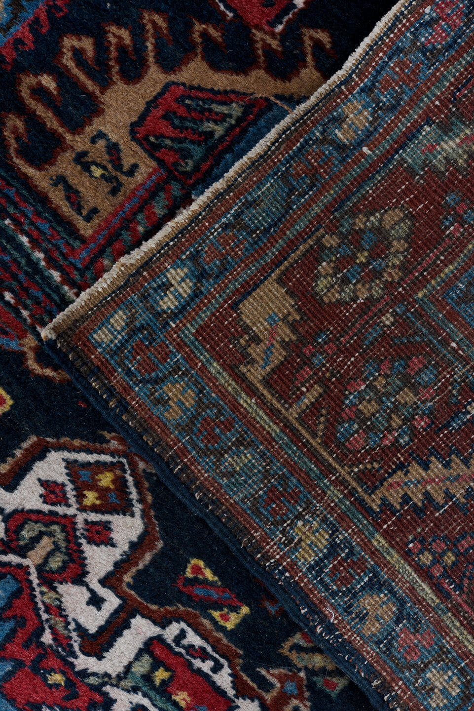 3' x 14' one-of-a-kind handmade vintage Heriz runner rug. Color palette: navy, brick red, ivory, sky blue, rust, camel