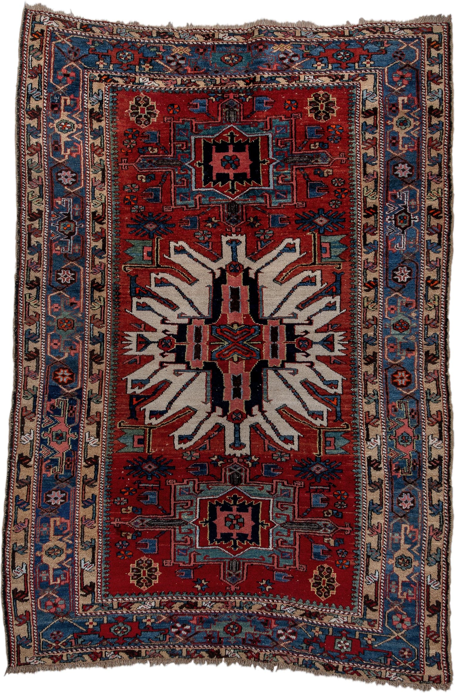 4' x 7' one-of-a-kind handmade antique Karaje rug. Color palette: rust, ivory, blue, navy, crimson, charcoal, camel, teal