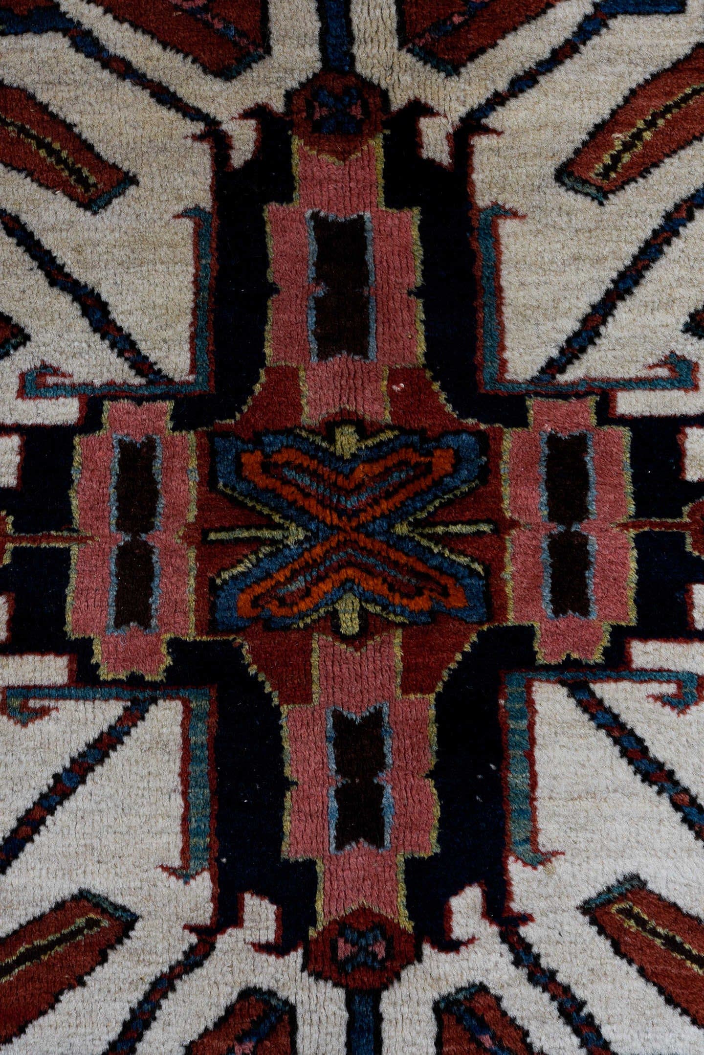 4' x 7' one-of-a-kind handmade antique Karaje rug. Color palette: rust, ivory, blue, navy, crimson, charcoal, camel, teal