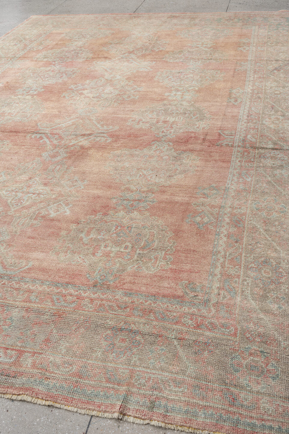 9' x 12' one-of-a-kind handmade antique Oushak large size rug. Color palette: blush, pale aqua, ivory, taupe, rose, sage