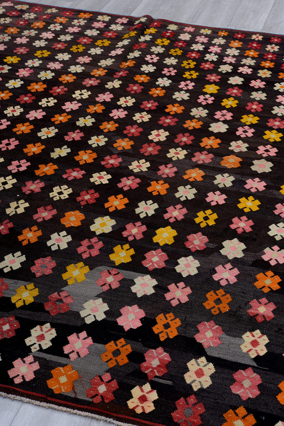 7' x 8' one-of-a-kind handmade antique Kilim rug. Color palette: charcoal, rose, ivory, rust, crimson, saffron, gray, black