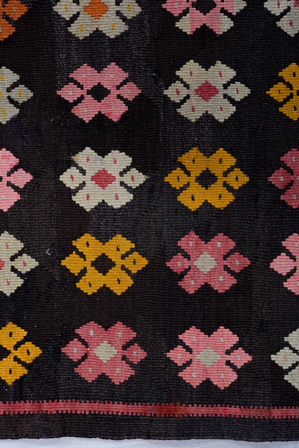 7' x 8' one-of-a-kind handmade vintage Kilim rug. Color palette: black, brown, charcoal, gray, light gray, orange, pink, red