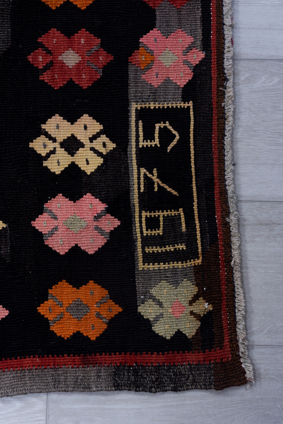 7' x 8' one-of-a-kind handmade vintage Kilim rug. Color palette: black, brown, charcoal, gray, light gray, orange, pink, red