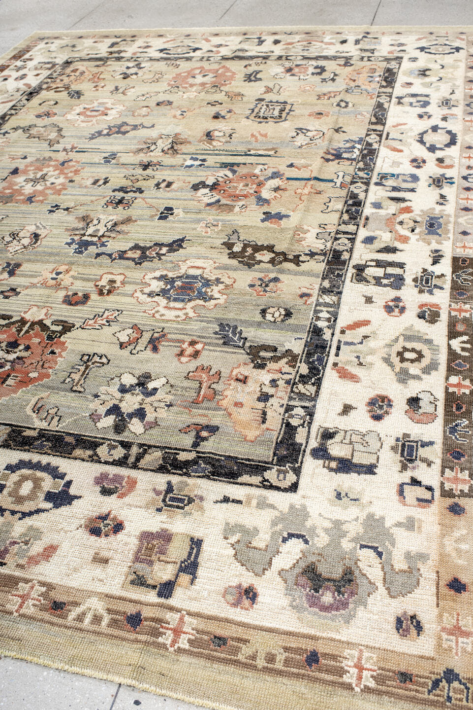 9' x 12' one-of-a-kind handmade vintage Oushak large size rug. Color palette: ivory, beige, charcoal, coral, blue, taupe