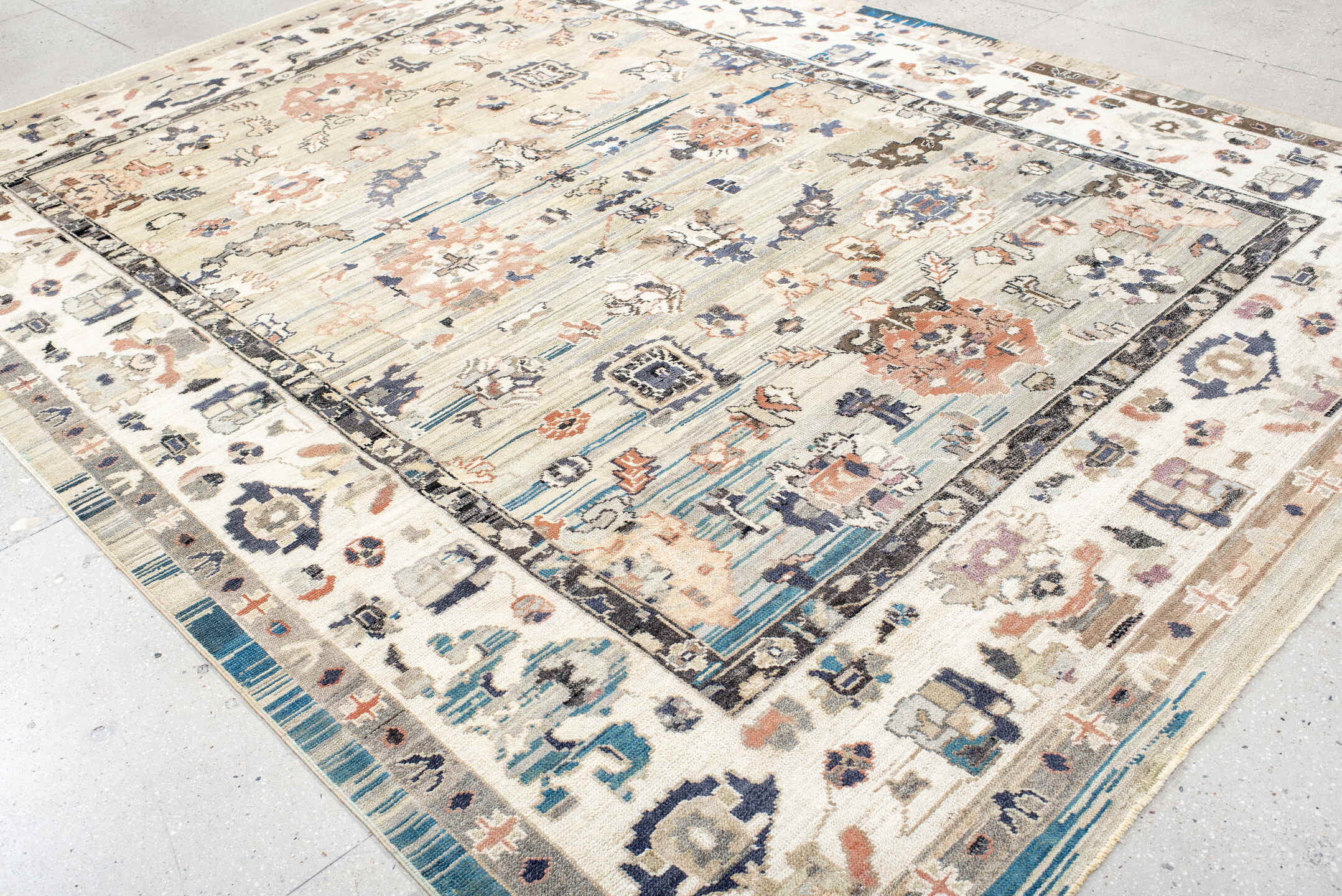9' x 12' one-of-a-kind handmade vintage Oushak large size rug. Color palette: ivory, beige, charcoal, coral, blue, taupe