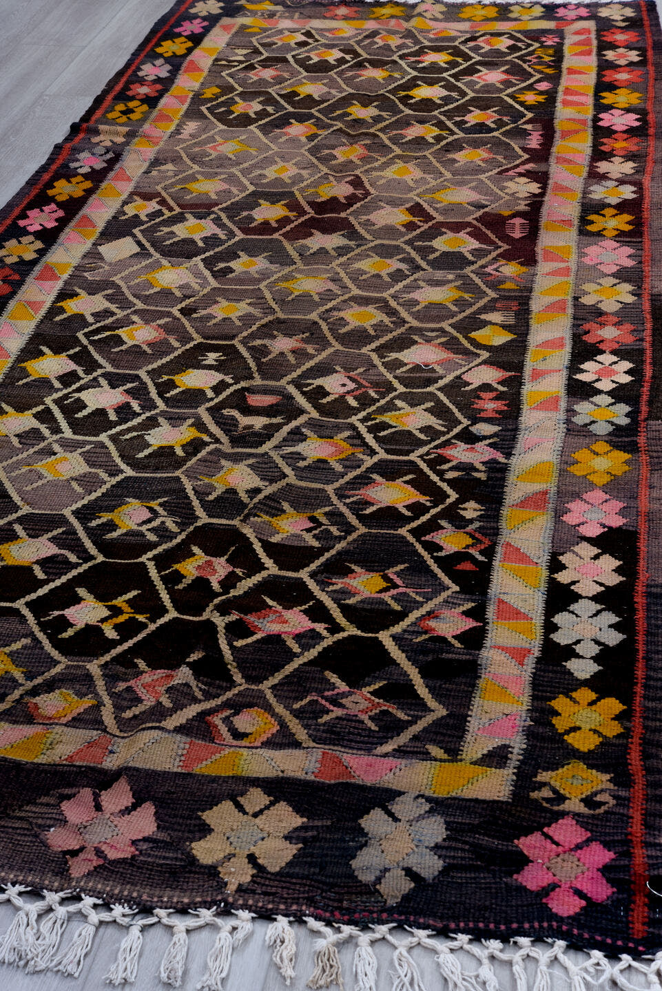 4' x 10' one-of-a-kind handmade antique Kilim runner rug. Color palette: charcoal, rose, ivory, saffron, taupe, coral, brown