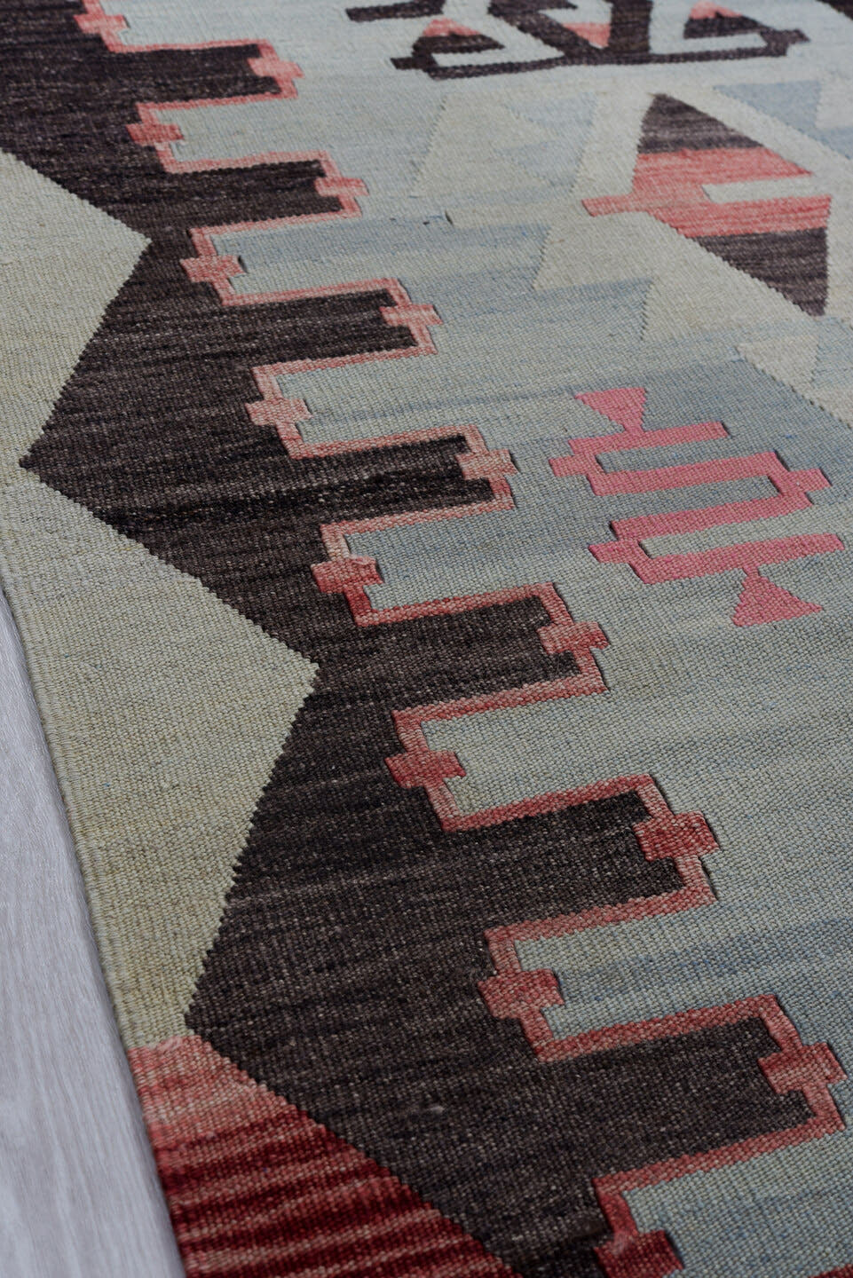 6' x 9' one-of-a-kind handmade antique Kilim medium size rug. Color palette: pale blue, charcoal, rose, ivory, crimson