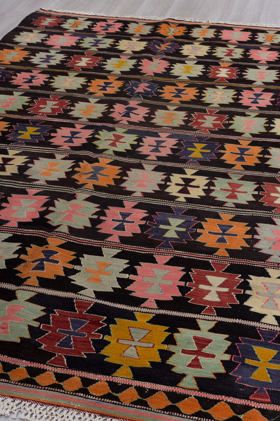 5' x 9' one-of-a-kind handmade vintage Kilim medium size rug. Color palette: black, blue, brown, charcoal, gray, light gray