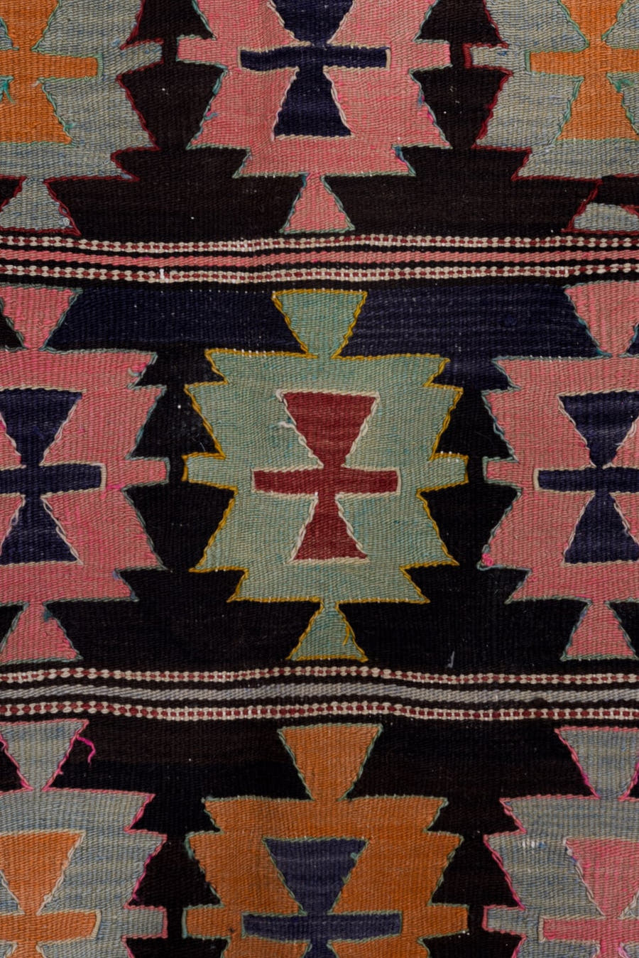 5' x 9' one-of-a-kind handmade antique Kilim medium size rug. Color palette: charcoal, rose, ivory, rust, sage, indigo