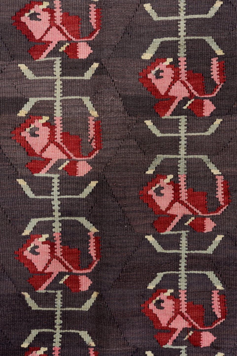 5' x 11' one-of-a-kind handmade antique Besserabian rug. Color palette: charcoal, taupe, crimson, rose, ivory, black, gray