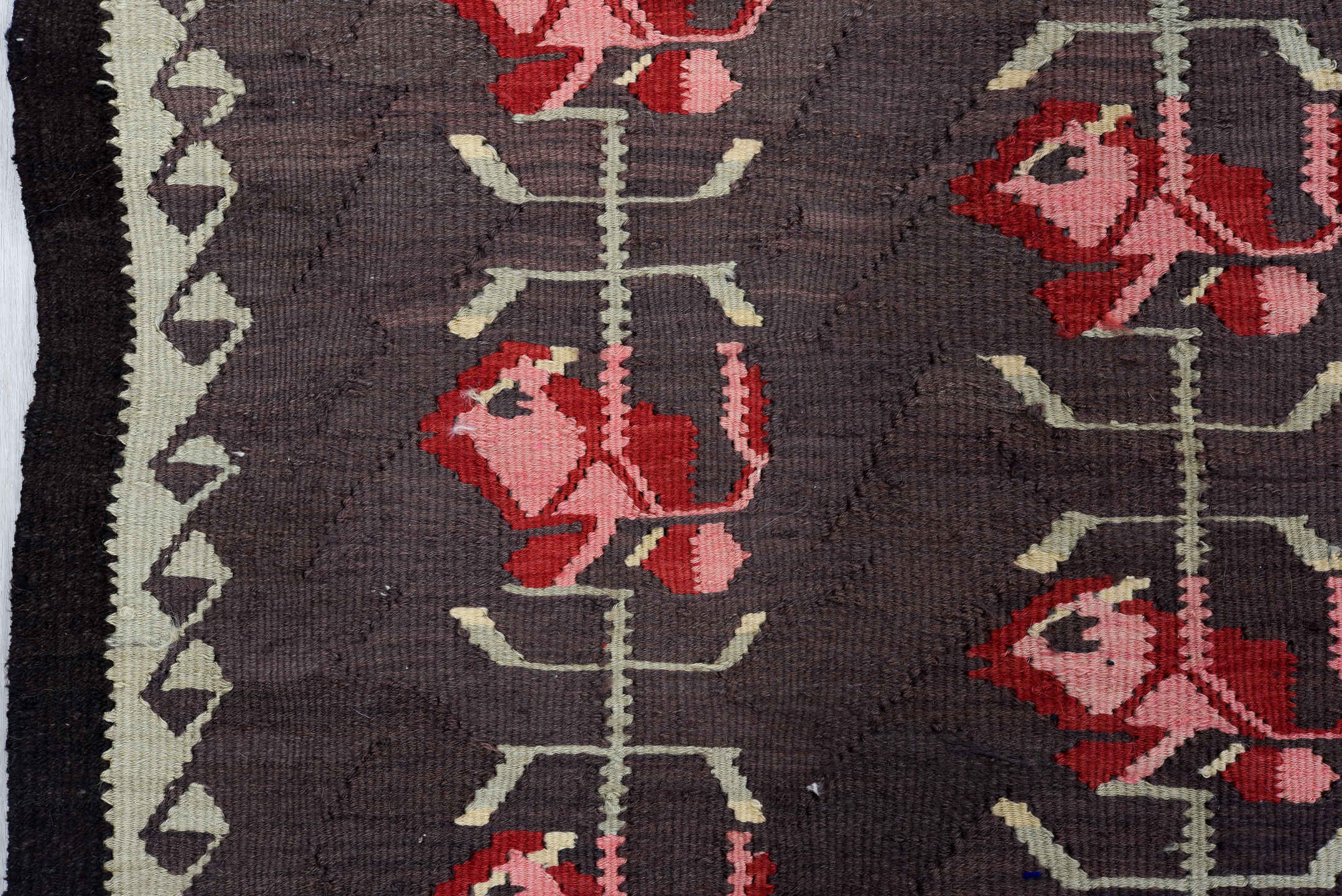5' x 11' one-of-a-kind handmade vintage Besserabian rug. Color palette: black, brown, gray, pink, red
