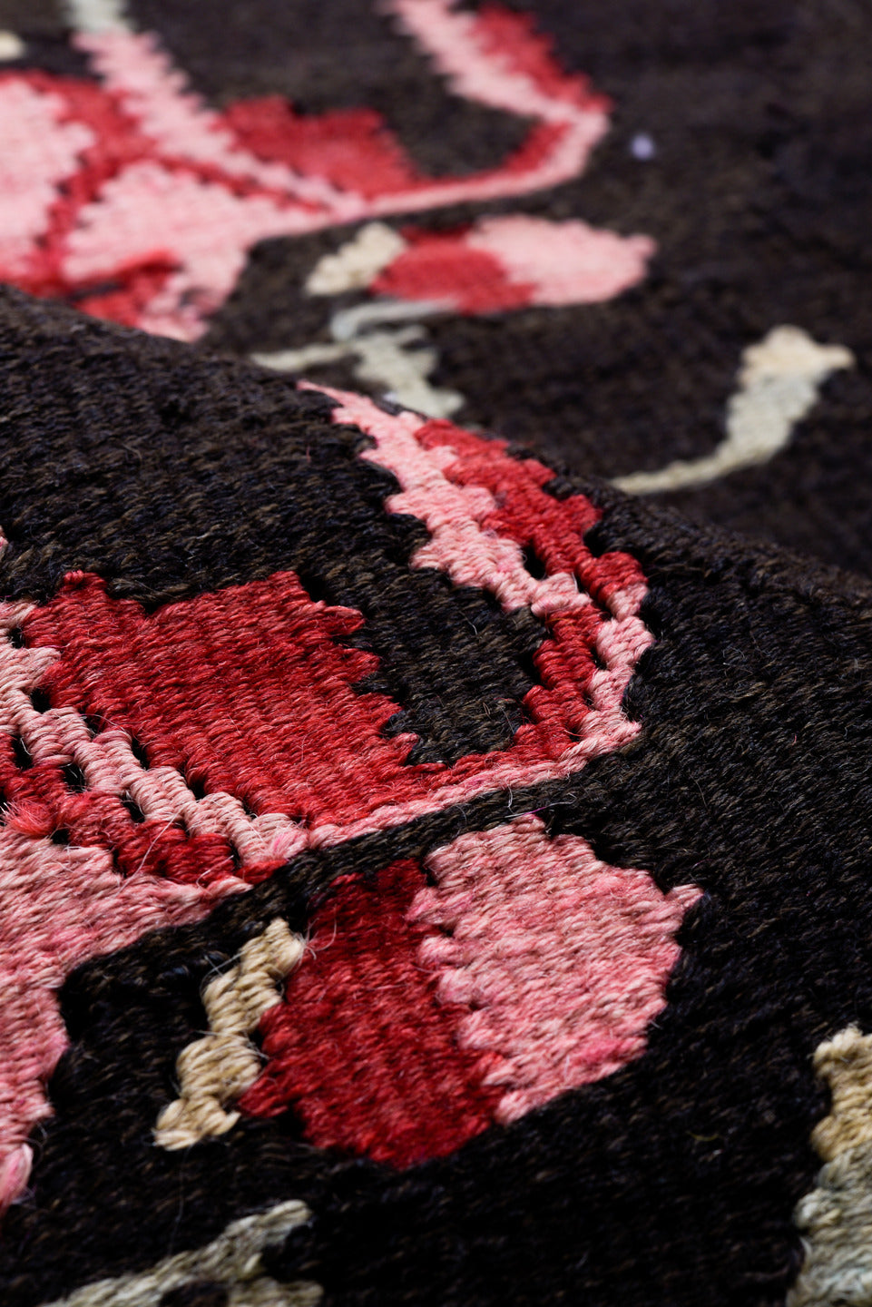 5' x 11' one-of-a-kind handmade vintage Besserabian rug. Color palette: black, brown, gray, pink, red