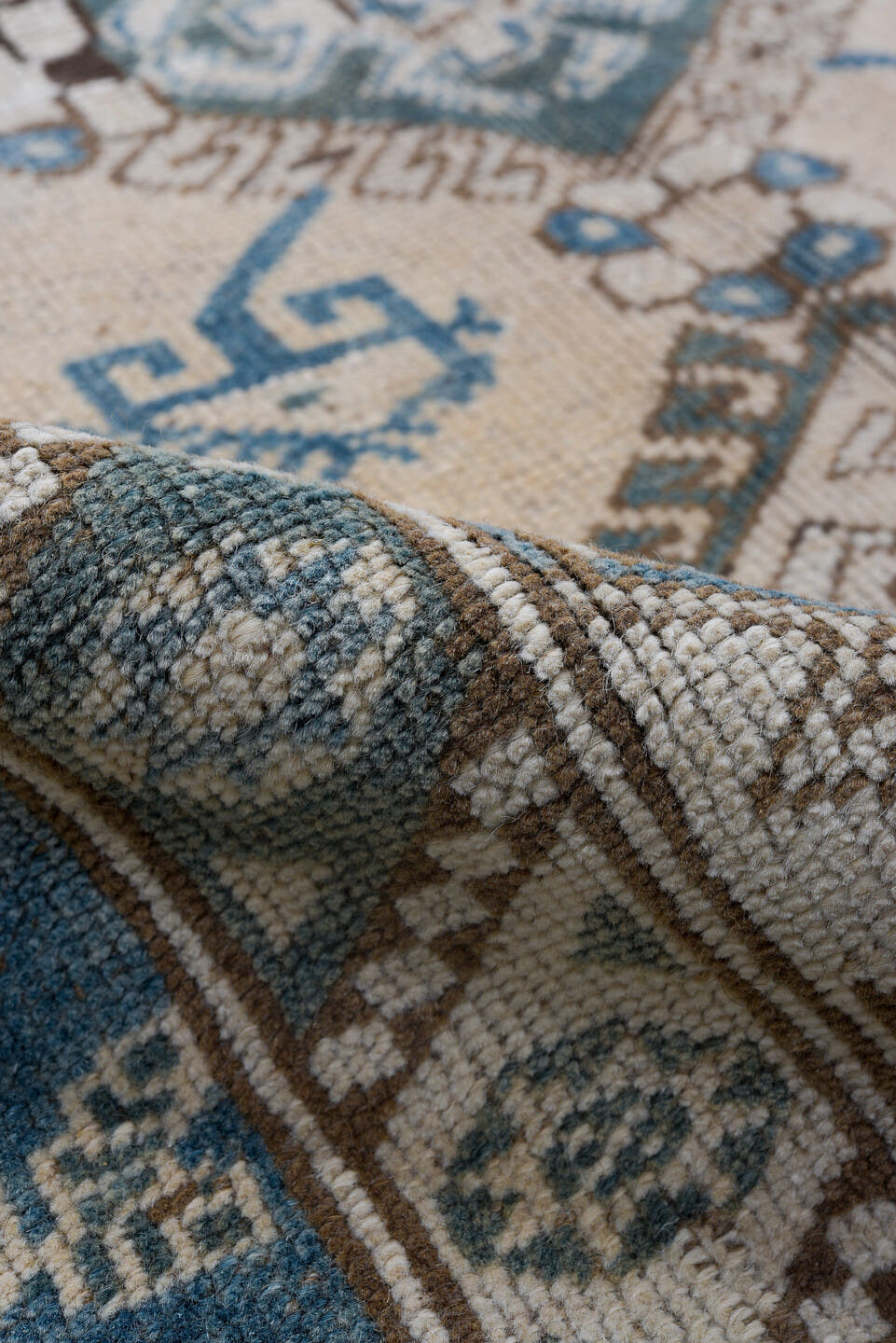 4' x 5' one-of-a-kind handmade vintage Oushak small size rug. Color palette: ivory, sky blue, taupe, brown, pale blue