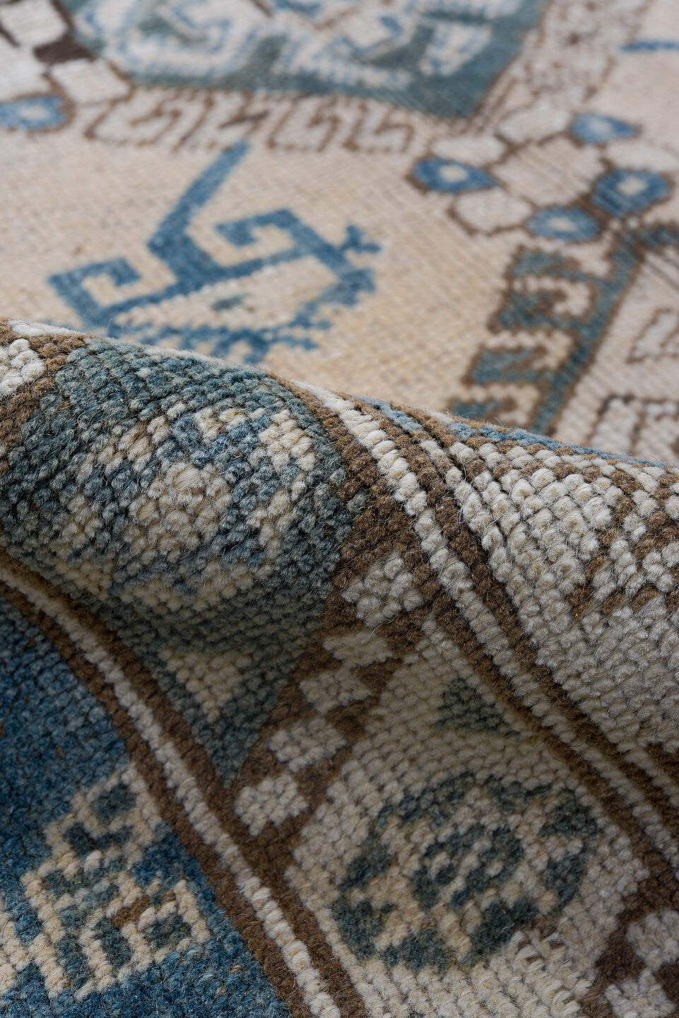 4' x 5' one-of-a-kind handmade vintage Oushak small size rug. Color palette: ivory, sky blue, taupe, brown, pale blue