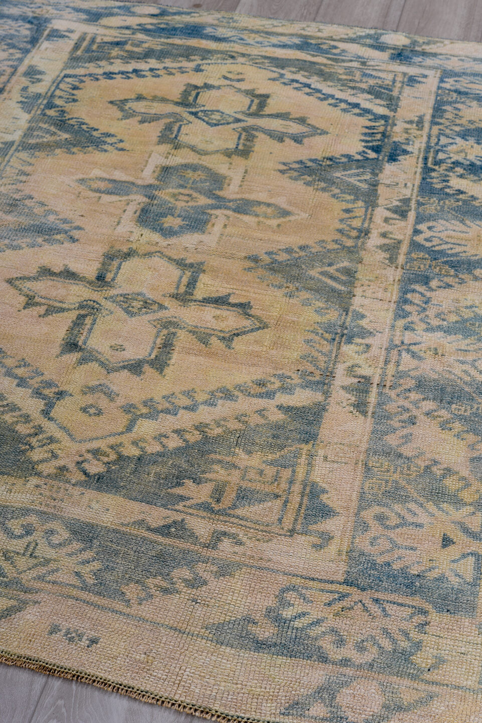 4' x 5' one-of-a-kind handmade vintage Oushak small size rug. Color palette: arapawa, black, blue, brown, dark gray