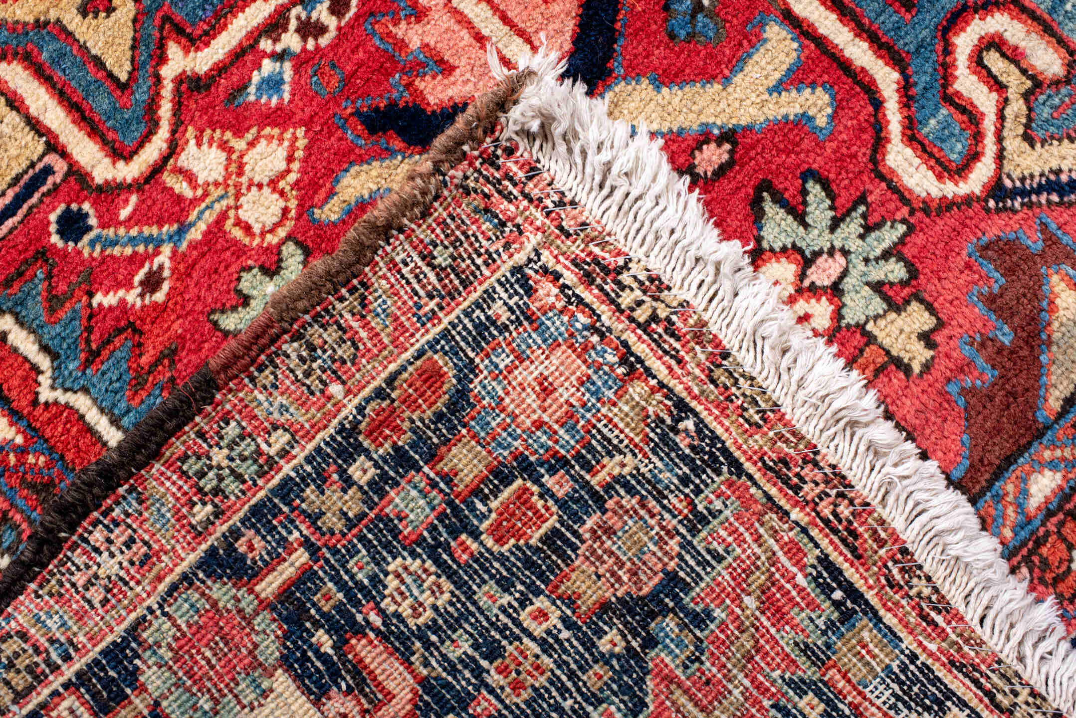 11' x 14' one-of-a-kind handmade vintage Heriz oversize rug. Color palette: red, navy, ivory, sky blue, coral, camel, pink